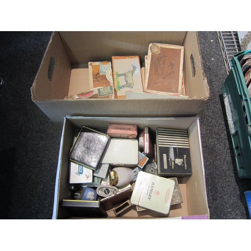 1408 - Two boxes of smoking related items including cigar boxes, cigarette tins, lighters etc