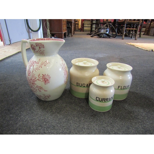 1434 - Three vintage kleen kitchen ware storage jars, sugar, currants, flour and an Alton wash jug (4)