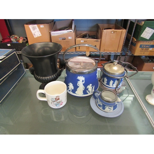 1449 - Wedgwood including Jasperware biscuit barrel and preserve pot, black urn and cup