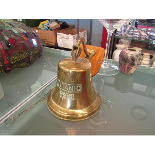 1462 - A wall hanging brass bell commemorating The Titanic 1912