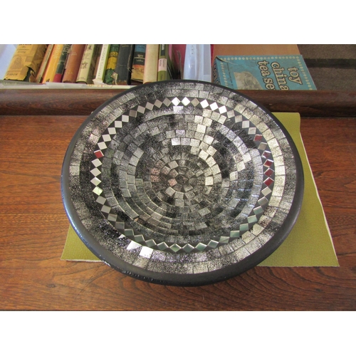 1465 - A decorative mosaic mirrored dish, 30cm diameter