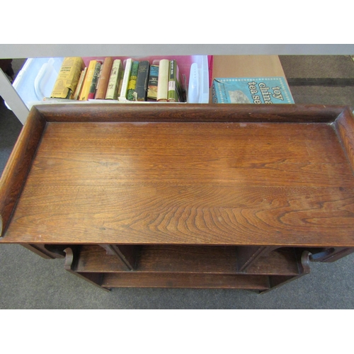 1466 - A 20th Century oak hall bookcase, with twin arched sections, 77cm wide, 33cm deep, 85cm high