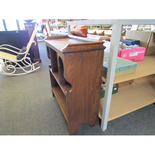 1466 - A 20th Century oak hall bookcase, with twin arched sections, 77cm wide, 33cm deep, 85cm high