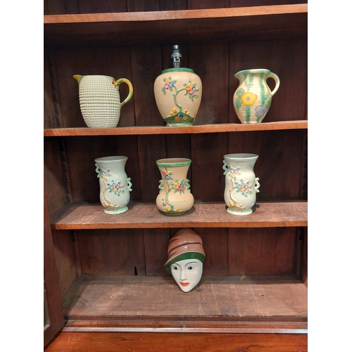 1049 - A collection of Crown Devon ceramics to include a wall mask by Dorothy Ann