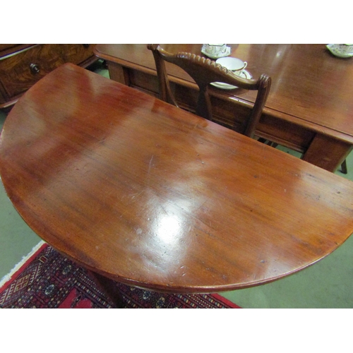 4006 - A George III mahogany demi-lune table on chamfered square leg supports, 72cm tall x 108cm wide x 53c... 