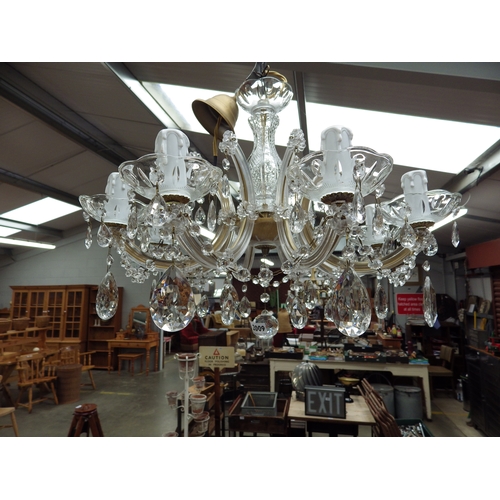 4396 - An eight branch glass chandelier