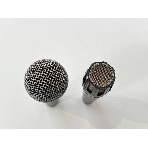 7024 - Two Shure microphones: Unidyne B and SM58, together with a case of cables etc