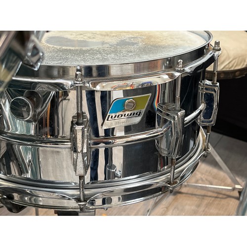 7061 - A 1970's Ludwig blue and olive badge four piece drum kit in blue oyster bowling ball finish, compris... 