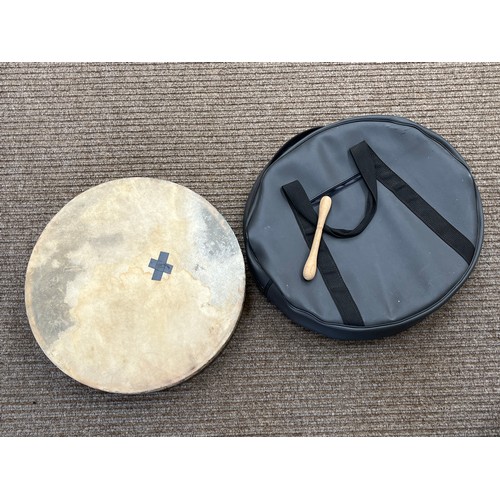 7062 - A bodhran with beater and case, tape to skin         (C)