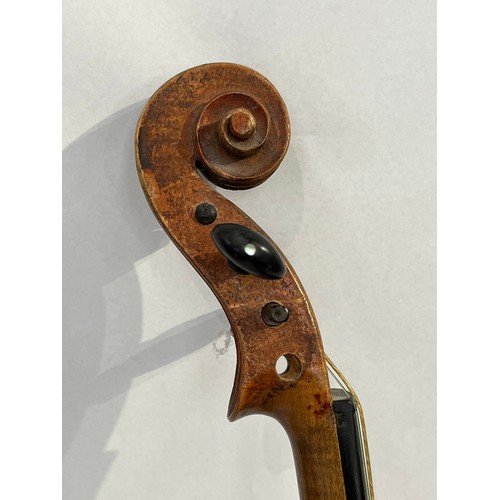 7067 - A late 19th / early 20th Century Guarneri copy violin, full size (4/4), two piece figured maple back... 