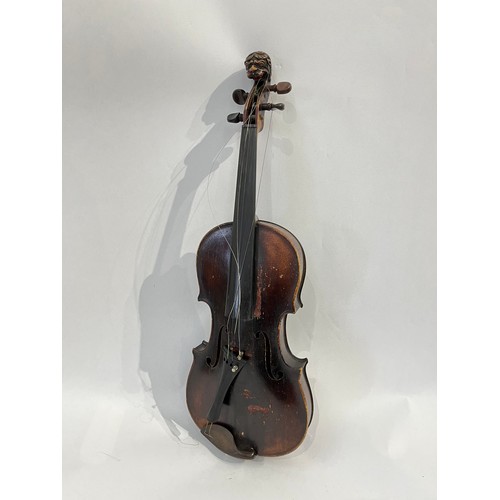 7068 - A late 19th / early 20th Century violin, the scroll as a lion, for renovation, with rosewood veneere... 