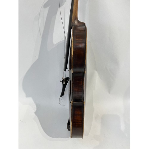 7068 - A late 19th / early 20th Century violin, the scroll as a lion, for renovation, with rosewood veneere... 