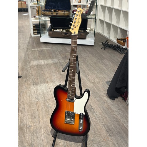 7083 - A Fender Squier Classic Vibe telecaster electric guitar, sunburst body, chip to rear