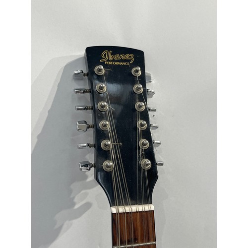 7087 - An Ibanez 12 string PF10-12BK acoustic guitar, black body, serial number 95011580, hard case        ... 