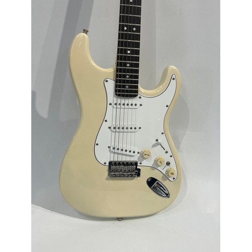 7092 - A Fender Squier electric guitar, ivory coloured body, cased, serial number CMY118000902