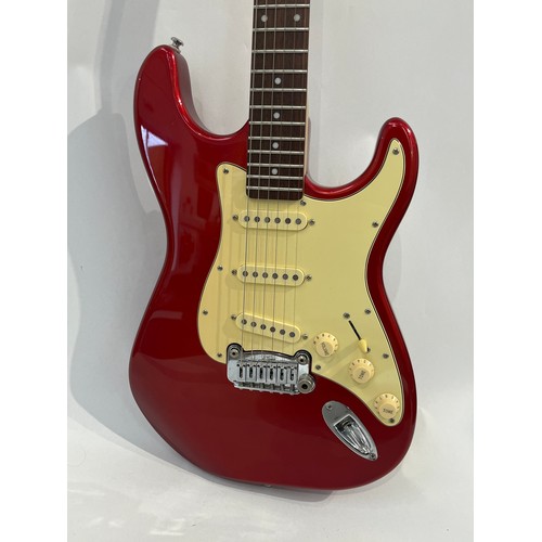 7093 - A G&L Legacy Tribute Series Stratocaster style electric guitar, red body, serial number 140903910, m... 