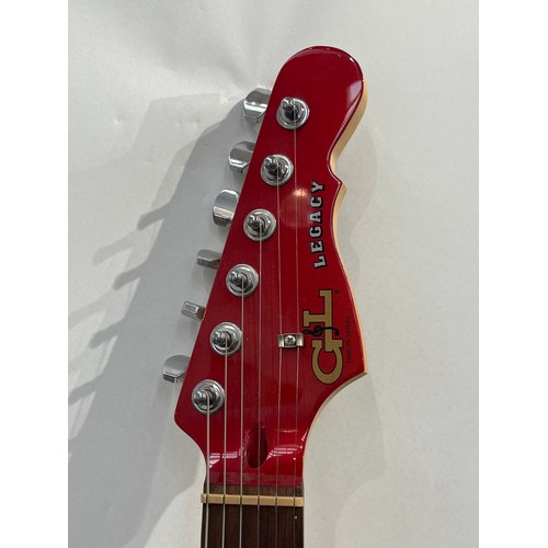 7093 - A G&L Legacy Tribute Series Stratocaster style electric guitar, red body, serial number 140903910, m... 