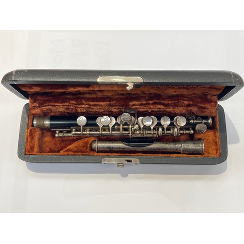 7122 - An ebony and silver plated piccolo, fitted case, no maker visible