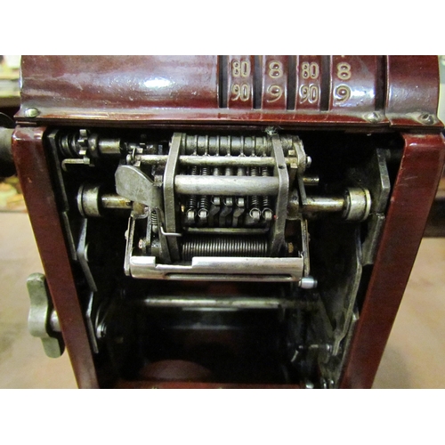 4009 - A small AEG German cash register, circa 1930-35, lever operation with side crank handle.  Maroon ena... 