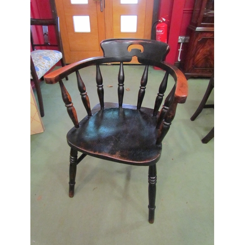 4018 - A Circa 1900 ebonised beech captain's chair with fret handle