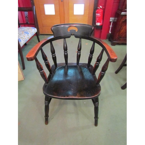 4018 - A Circa 1900 ebonised beech captain's chair with fret handle