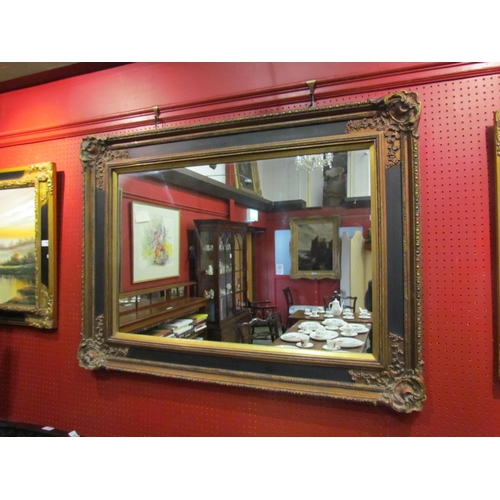 4041 - A classical gilded wall mirror with beaded detail, 86cm x 117cm total