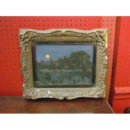 4070 - HENRY P. STEVENS (Beccles artist): An oil on panel depicting moonlit countryside dwellings, gilt ges... 