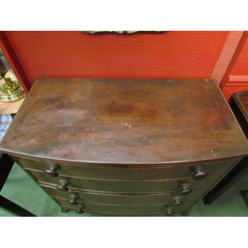 4072 - An early to mid 19th Century mahogany bow front chest of four graduating long drawers with bun handl... 