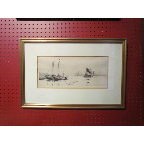 4077 - A William Wyllie (1851-1931) pencil signed etching of boats, framed and glazed, 12cm x 30cm image si... 