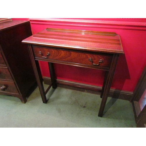 4079 - A Georgian style mahogany hall table, the single frieze drawer over reeded square legs joined by str... 