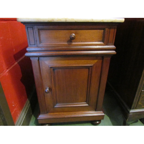 4083 - A 19th Century walnut bedside chest the marble top over a single drawer and cupboard door on a plint... 