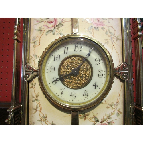 4086 - A mantel clock, ornate brass frame and ceramic tile with floral decoration holding platform timepiec... 