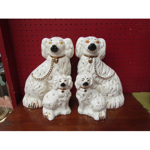 4097 - Two pairs of Royal Doulton Staffordshire style spaniels, tallest 25cm