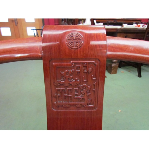 4101 - A pair of Chinese carved teak horseshoe armchairs with Greek key frieze over ball in claw cabriole f... 