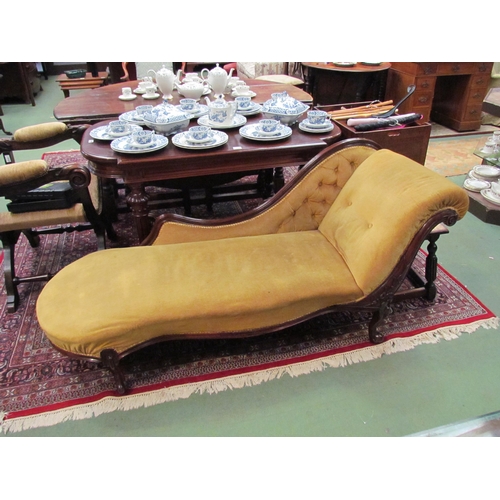 4107 - A mid 19th Century rosewood serpentine front chaise longue the swan backrest over carved cabriole le... 