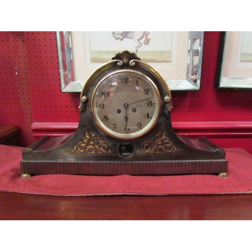 4119 - A mantel clock, early 20th Century, patinated steel and brass case with unmarked count-wheel movemen... 