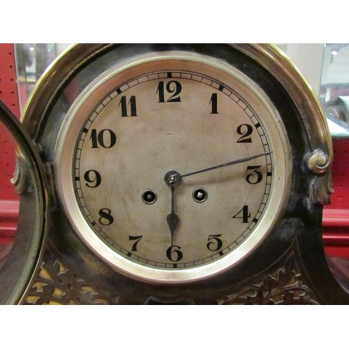 4119 - A mantel clock, early 20th Century, patinated steel and brass case with unmarked count-wheel movemen... 