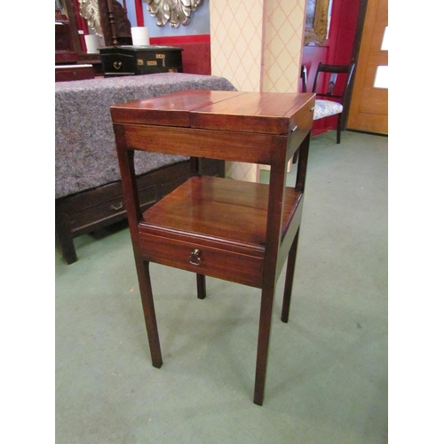 4156 - A George III mahogany gentleman's two tier washstand with twin lidded top over a single drawer on ch... 