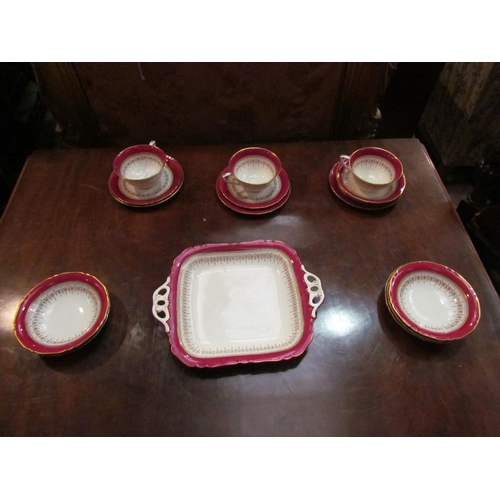 4162 - A quantity of Royal Worcester ‘Regency’ pattern table ware, white and puce with gilt patterns       ... 