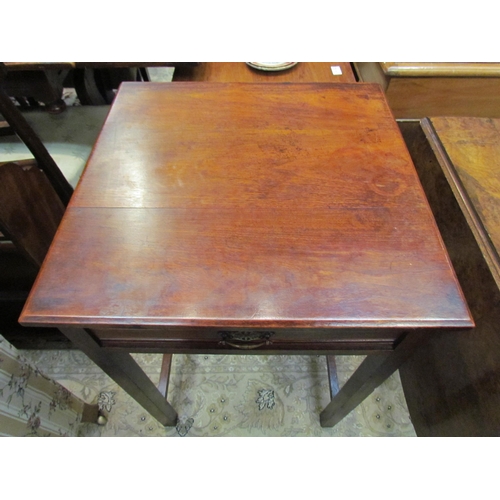 4179 - A circa 1900 walnut writing table/desk with single frieze drawer on square legs joined by stretchers... 