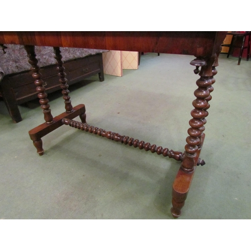 4182 - A Victorian side table, bobbin supports and stretcher, 66cm tall x 90cm long x 47cm deep