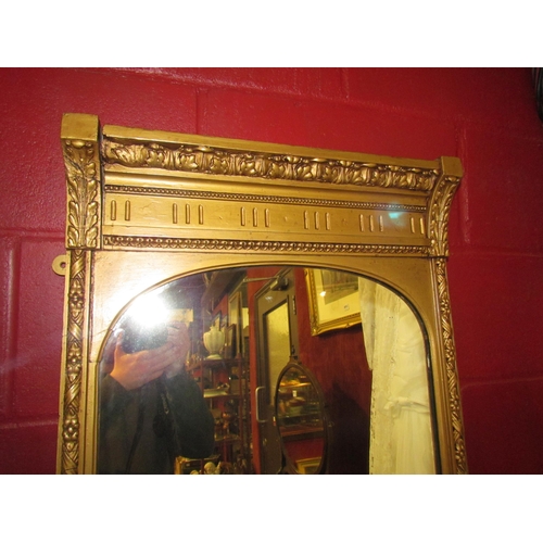 4191 - A large 19th Century decorative gilt framed plate glass pier mirror, 173cm x 53cm total  
     (R)  ... 