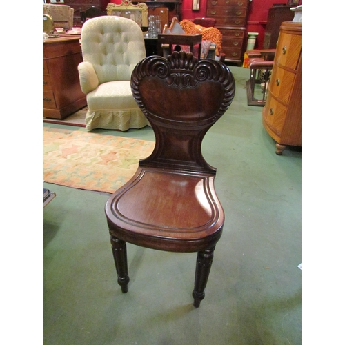 4199 - A Victorian mahogany hall chair with carved, fluted backrest, melon fluted fore legs            (R) ... 