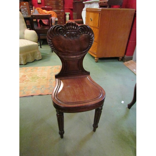 4199 - A Victorian mahogany hall chair with carved, fluted backrest, melon fluted fore legs            (R) ... 