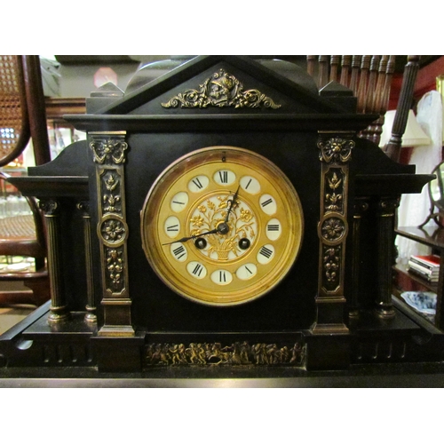 4200 - A Victorian slate mantel clock of architectural form, Roman numeral dial, bearing presentation plaqu... 