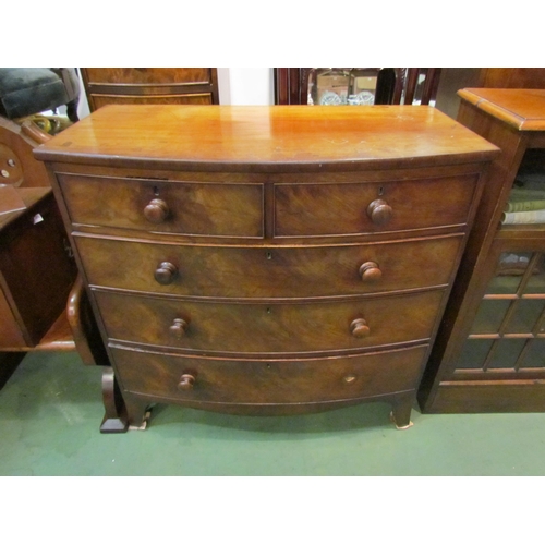 4210 - A Victorian flame mahogany bow-fronted chest of two short over three long drawers, bracket feet, bun... 