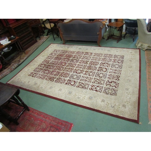 4395 - A maroon and cream floral rug,  330cm x 240cm            (R)       £60