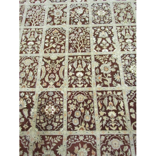 4395 - A maroon and cream floral rug,  330cm x 240cm            (R)       £60