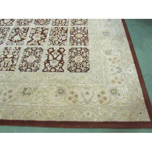 4395 - A maroon and cream floral rug,  330cm x 240cm            (R)       £60