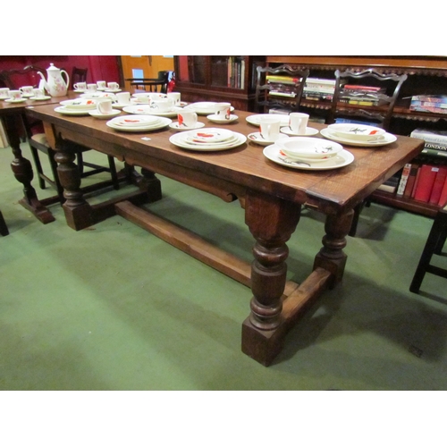 4064 - A handcrafted 18th Century revival oak refectory dining table, heavy turned supports, 75cm tall x 79... 